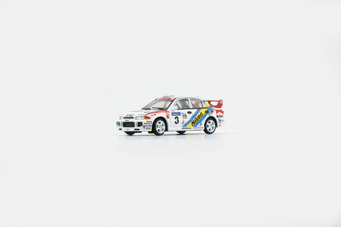 BM Creations 1:64 Mitsubishi Lancer EVO III (LHD) Hong Kong Beijin Rally 1995 #3 NIKON (64B0224) Diecast Car Model Available In August 2025 Pre Order Now