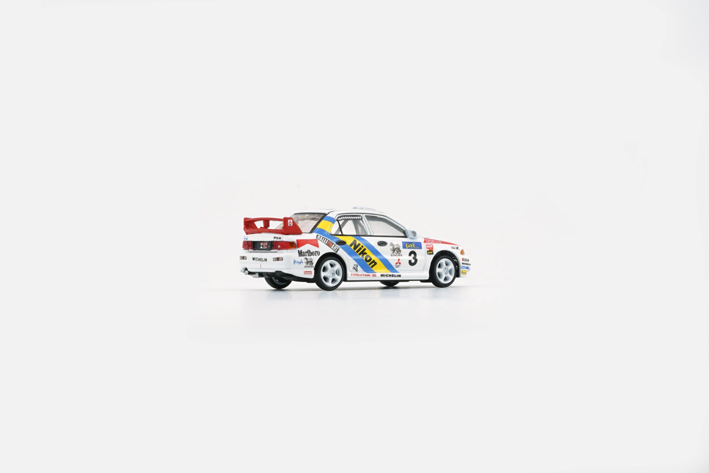 BM Creations 1:64 Mitsubishi Lancer EVO III (LHD) Hong Kong Beijin Rally 1995 #3 NIKON (64B0224) Diecast Car Model Available In August 2025 Pre Order Now